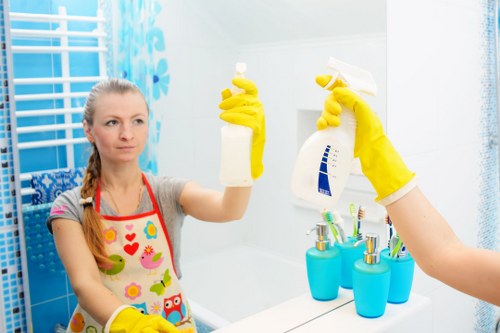 Cleaner preparing a home cleaning service booking