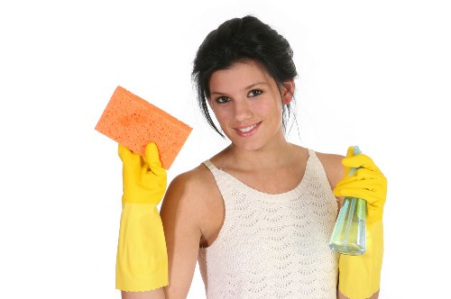 Cleaning expert in Lambeth working in a tidy living space
