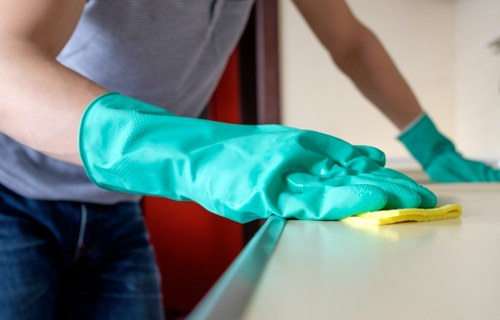 Cleaning team reviewing service liability and safety terms