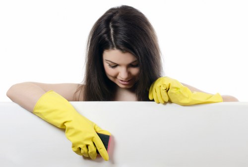 Cleaner working in a Lambeth flat during a one off clean